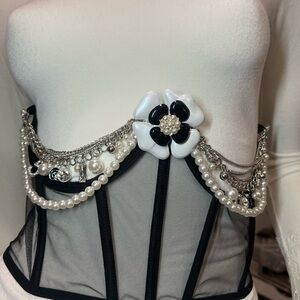 Elegant Black and White Corset with Pearl and Chain Details